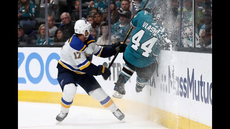 Marc-Edouard Vlasic of the San Jose Sharks crashes into the boards in front of Jaden Schwartz of the St. Louis Blues during Game 2 of the Western Conference Final of the Stanley Cup Playoffs in San Jose on Monday, May 13.