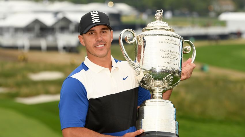 FARMINGDALE, NEW YORK - MAY 19: Brooks Koepka of the United States poses with the Wanamaker Trophy during the Trophy Presentation Ceremony after winning the final round of the 2019 PGA Championship at the Bethpage Black course on May 19, 2019 in Farmingdale, New York. (Photo by Ross Kinnaird/Getty Images)