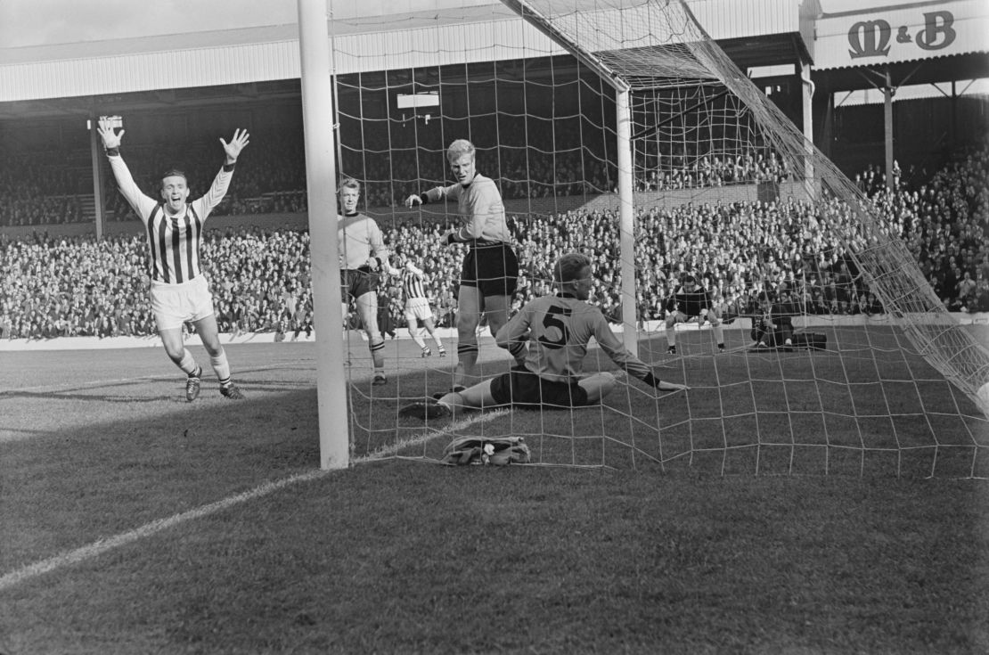 WBA's Jeff Astle of West scores against Wolves in October 1964.