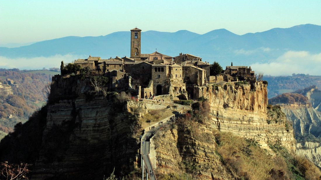 <strong>Civita di Bagnoregio:</strong> Dubbed the "Dying City," this remote village perched precariously atop a plateau has an estimated population of around 12. 