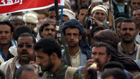 Cheeks bulging with khat are seen everywhere in Yemen. Here, armed supporters of the Houthis chew while at a rally in Sanaa in 2015.