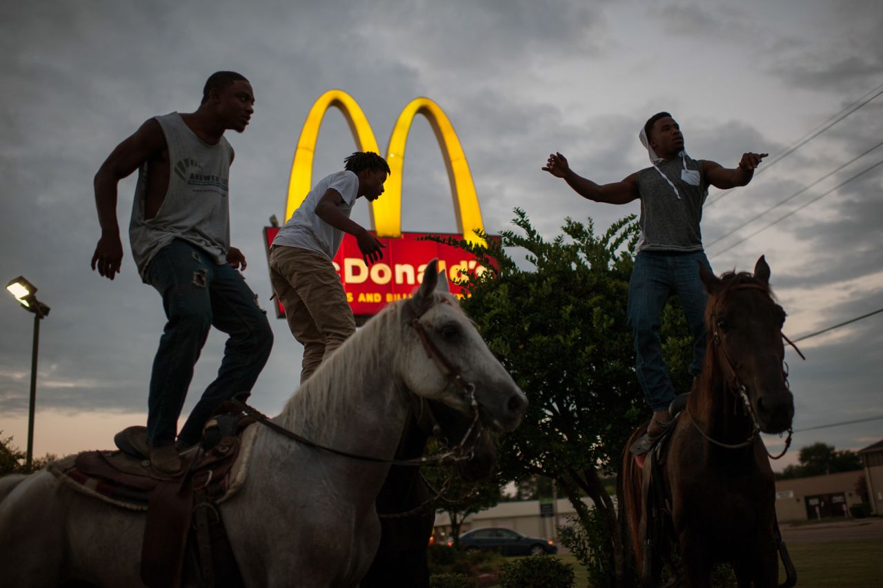 Doyle captured a group of riders in front of a McDonald's.