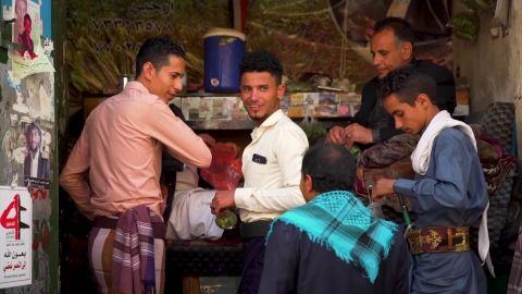Young and old frequent the market stalls selling khat in the capital, Sanaa.
