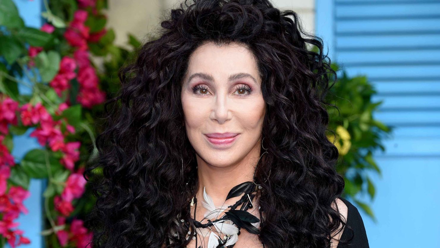 Cher poses on the red carpet upon arrival for the world premiere of the film "Mamma Mia! Here We Go Again" in London on July 16, 2018. (Photo by Anthony HARVEY / AFP)        (Photo credit should read ANTHONY HARVEY/AFP/Getty Images)