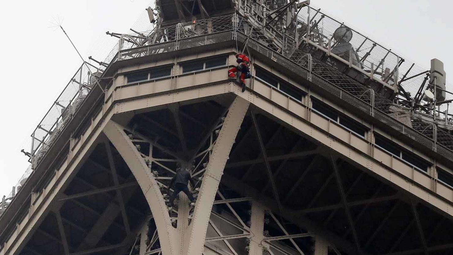The Eiffel Tower has been closed to visitors after a man was seen scaling it.