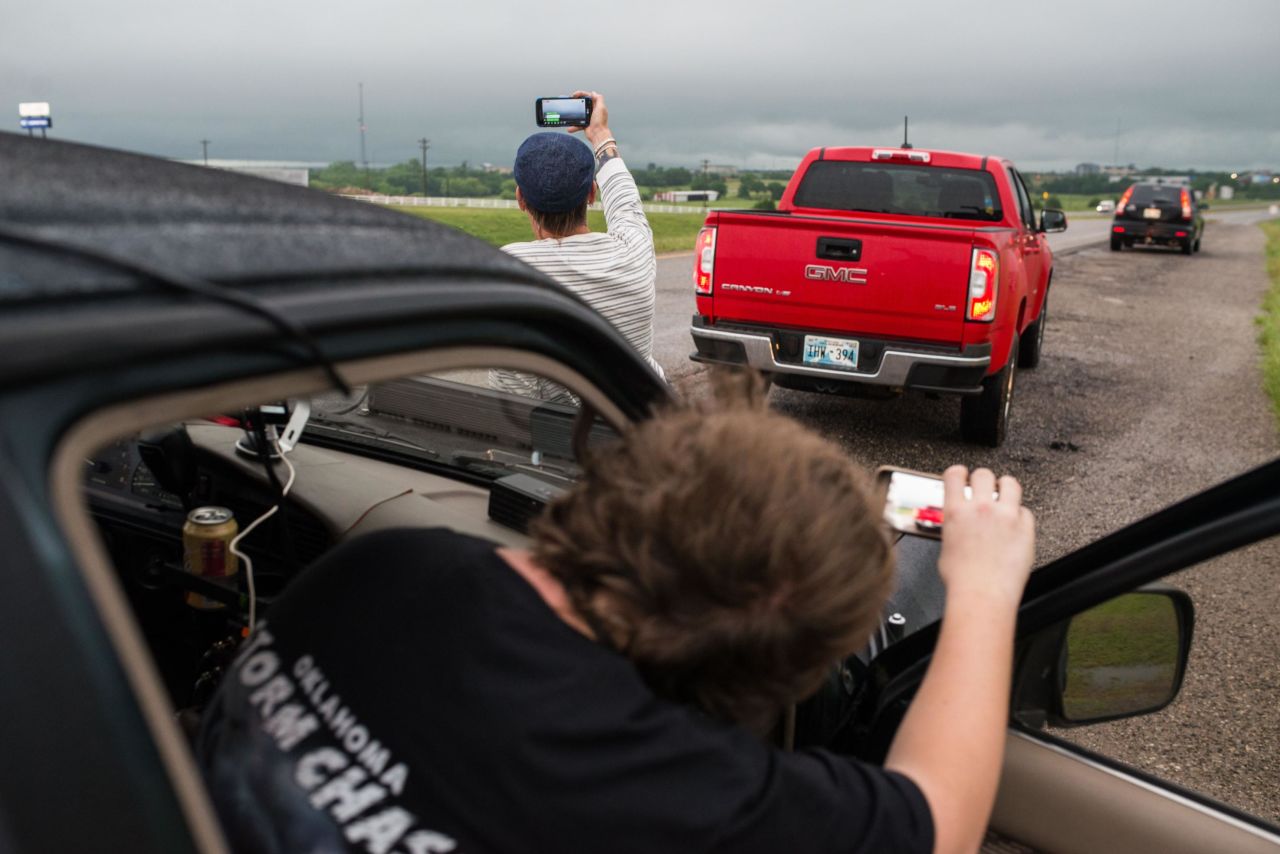 Brandon Alexander, 18; and Daniel Brown, 48, are local storm chasers who followed the storm to Perry, Oklahoma. "We've only been doing this for about a year," Brown said May 20.