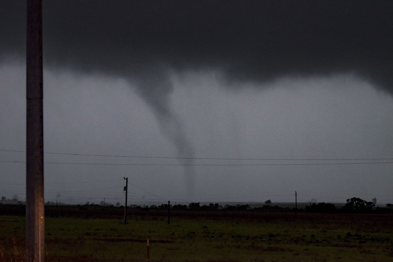 A funnel-shaped cloud passes just south of Perry, Oklahoma on May 20. 