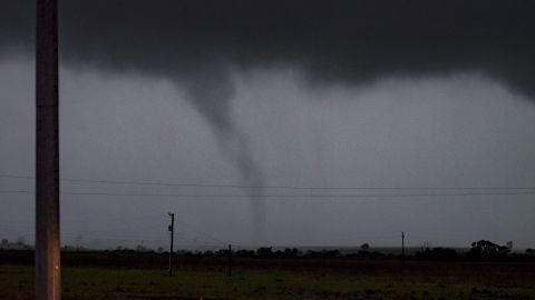 A tornado passes just south of Perry, Oklahoma.