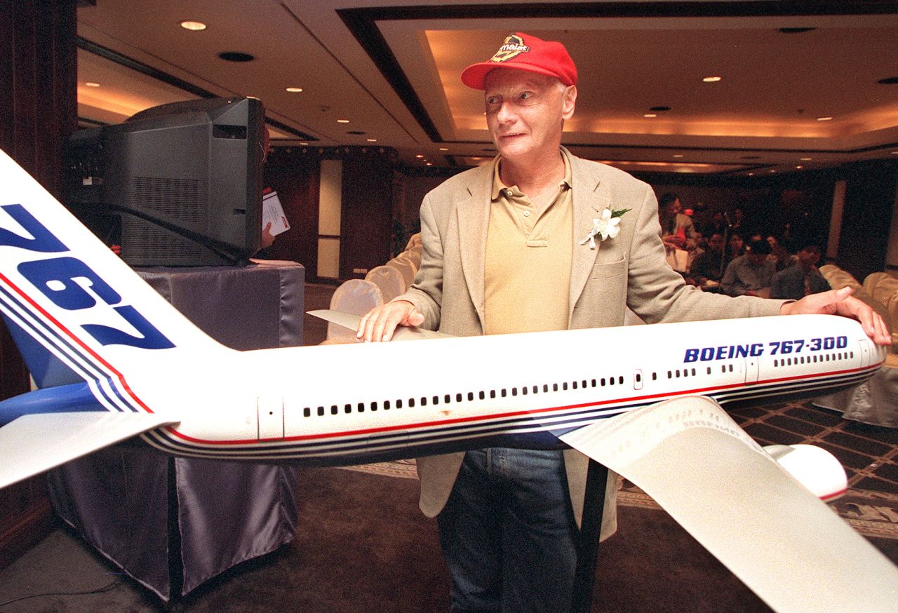 Lauda poses with a model of a Boeing 767 in Bangkok on September 1, 1999. Lauda flew the 767, with 100 passengers aboard, to Bangkok on the first leg of a twelve-day voyage around the world.