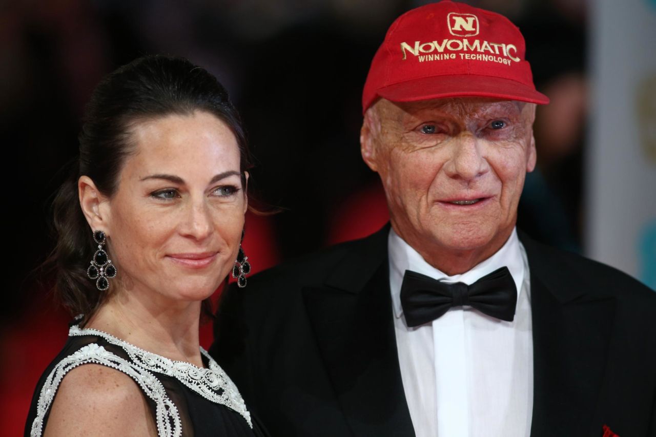 Lauda poses with his wife Birgit on the red carpet for the British Academy Film Awards at the Royal Opera House in London on February 16, 2014.