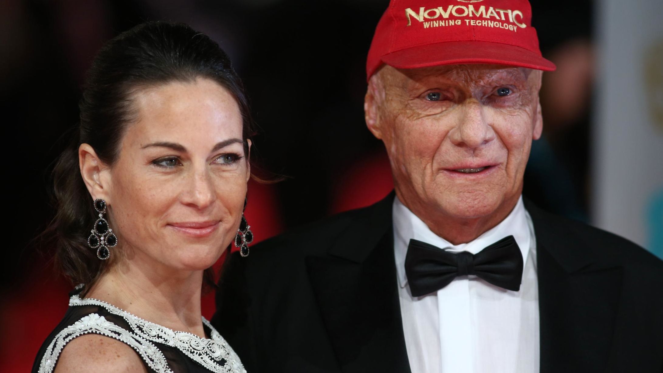 Lauda poses with his wife Birgit on the red carpet for the British Academy Film Awards at the Royal Opera House in London on February 16, 2014.