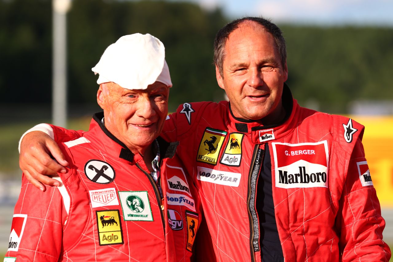 Lauda, a non-executive chairman of Mercedes GP, poses with former driver Gerhard Berger after qualifying ahead of the Austrian Formula One Grand Prix at Red Bull Ring on June 21, 2014 in Spielberg, Austria.