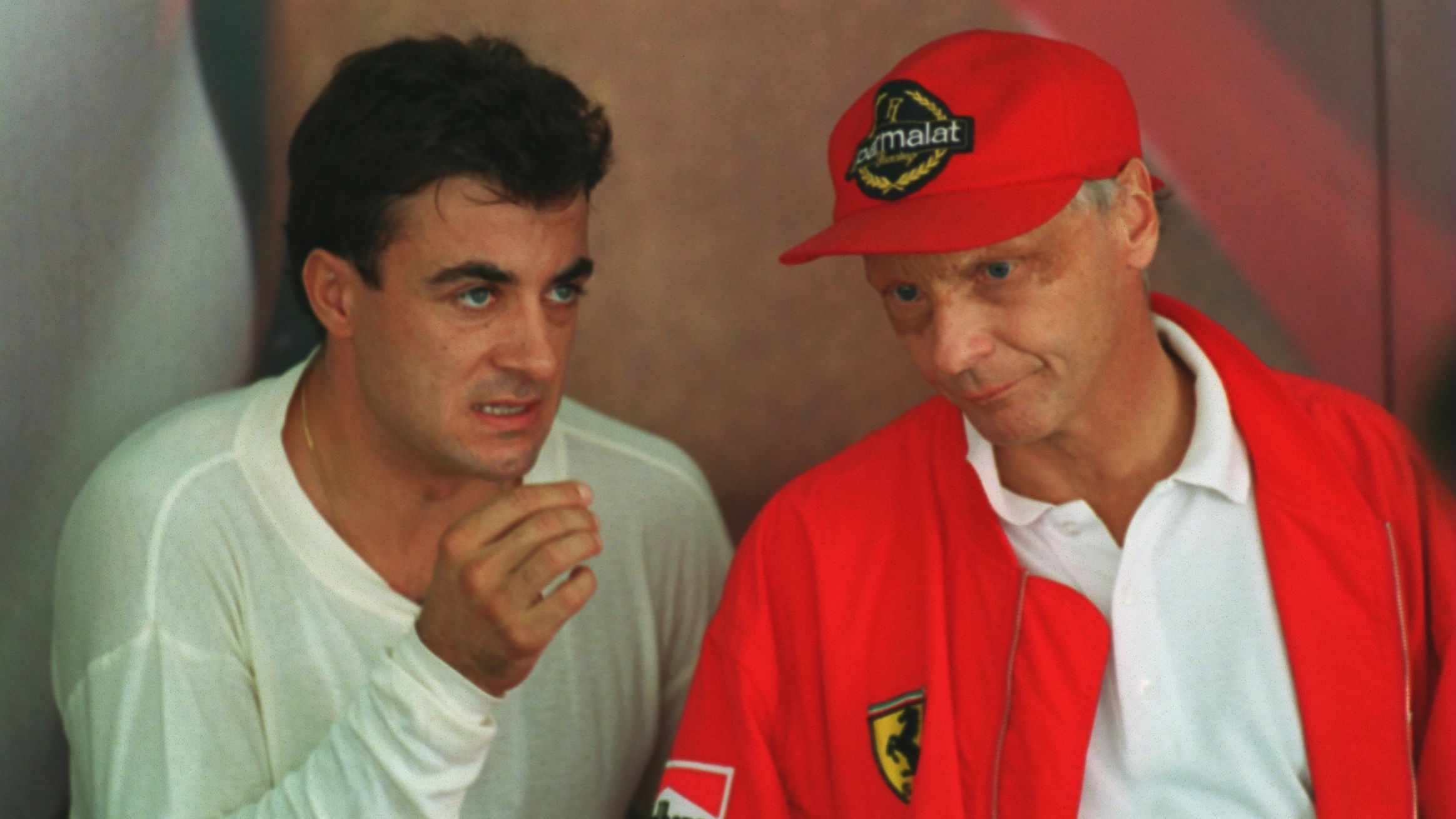 Ferrari driver Jean Alesi of France talks Lauda during the first practice session of the 1994 Formula One Grand Prix of Europe in Jerez, Spain on October 14, 1994.