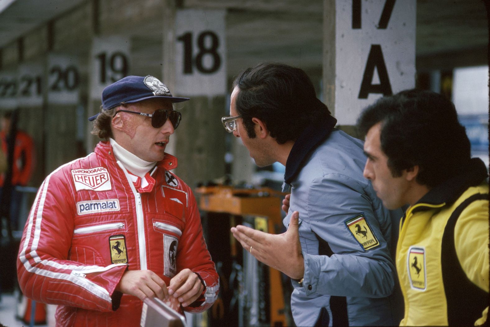 Lauda with Formula One racing car designer Mauro Forghieri, during Grand Prix Deutschland 1977 on July 31, 1977.