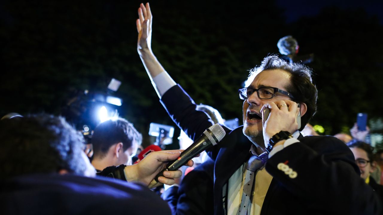 Jerome Triomphe, one of the two lawyers representing Lambert's parents, recieves the news that he will be put back on life support late on Monday.