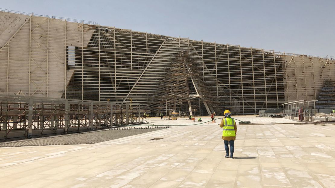 The building's facade is designed  to subtly mirror the nearby pyramids.