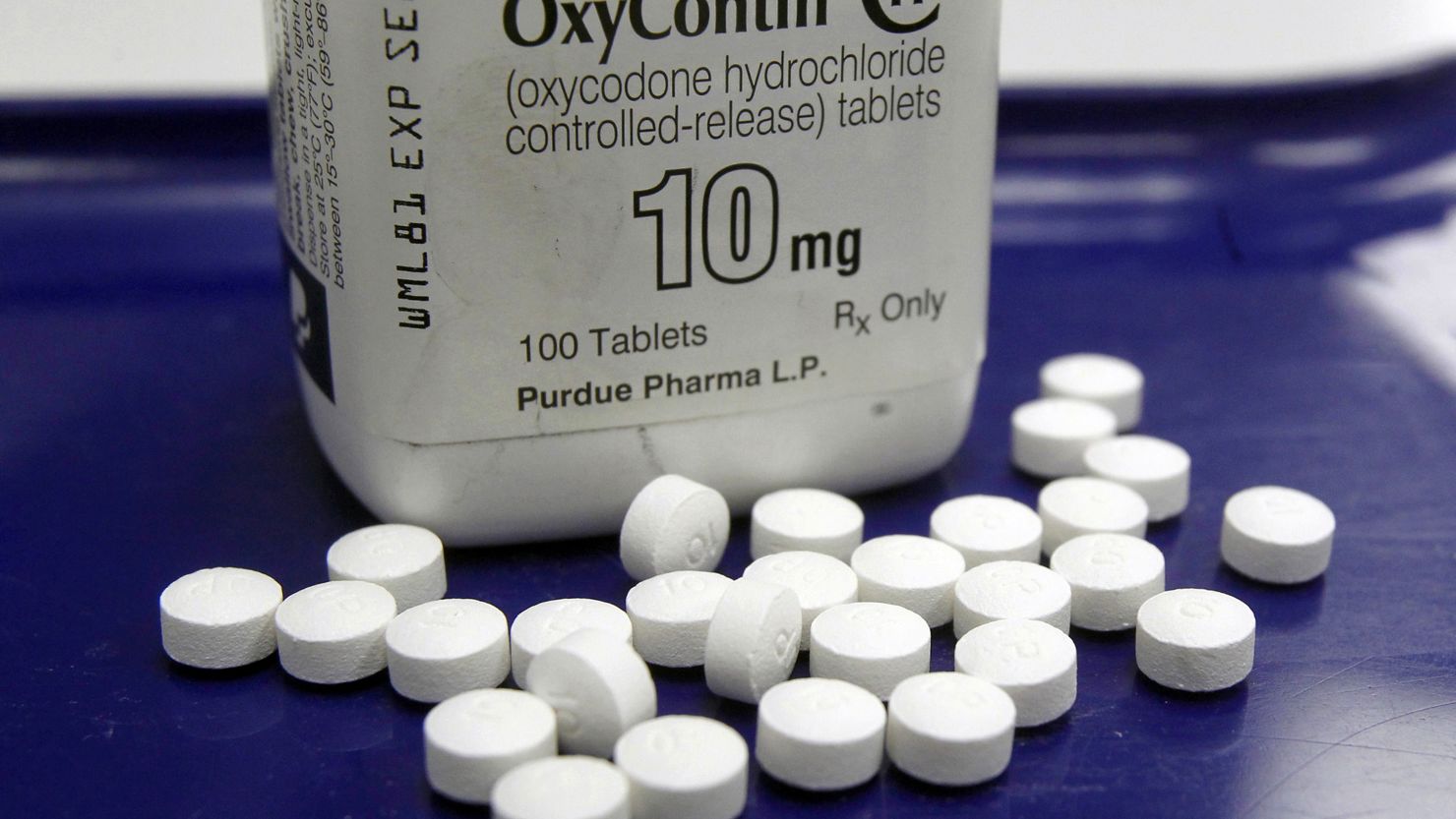 OxyContin pills arranged for a 2013 photo at a pharmacy, in Montpelier, Vermont.