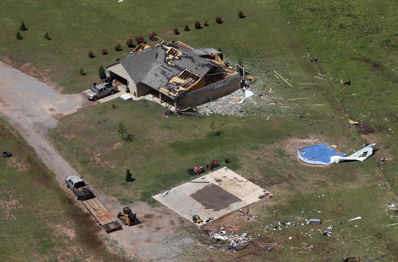 A house damaged by a tornado is seen in Mangum, Oklahoma, Tuesday, May 21.
