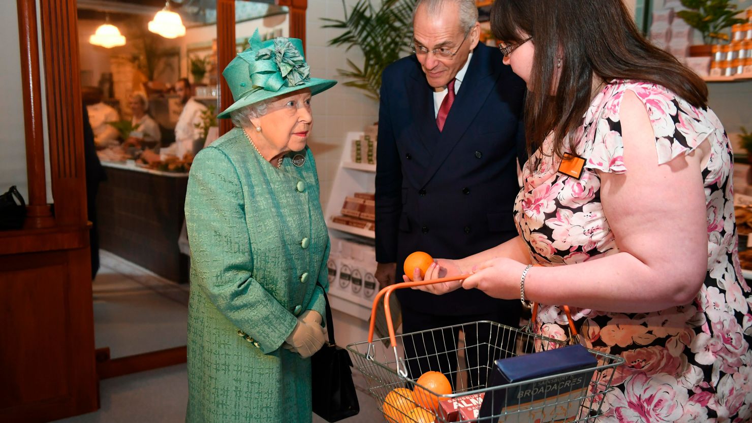 The Queen seemed to enjoy her visit to the 1860s style Sainsbury's store.