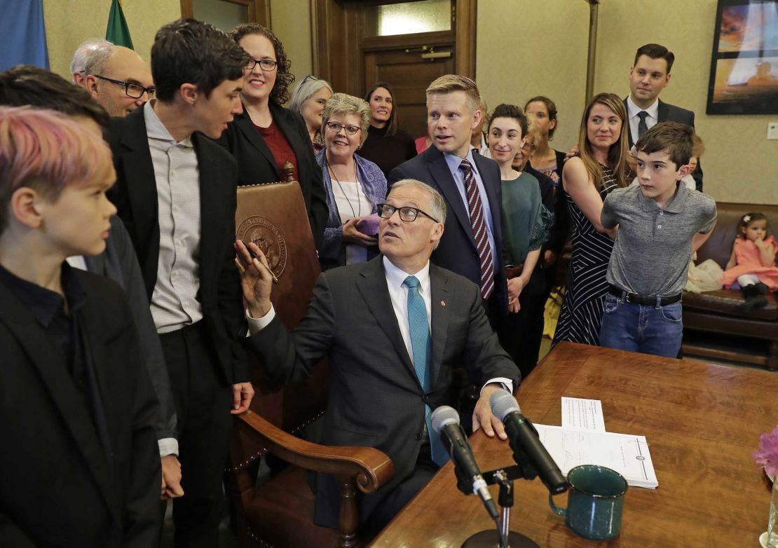 Washington Gov. Jay Inslee signs a bill that allows licensed facilities to offer "natural organic reduction," which turns a body into soil in a span of several weeks. 