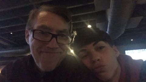 Elbie Seibert and his father pose for a photo on Thanksgiving, one day before his father's cancer diagnosis.