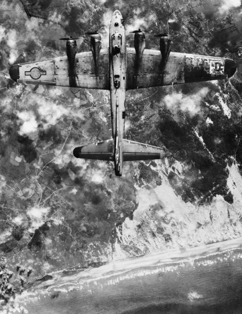 A B-17G of the 100th Bomb Group USAAF bombing beach defenses near Boulogne as part of the D-Day deception plan, on June 5, 1944.