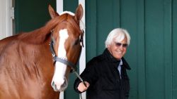 BALTIMORE, MD - MAY 16: Trainer Bob Baffert walks Kentucky Derby winner Justify in the barn after the horse arrived at Pimlico Race Course for the upcoming Preakness Stakes on May 16, 2018 in Baltimore, Maryland. (Photo by Rob Carr/Getty Images)