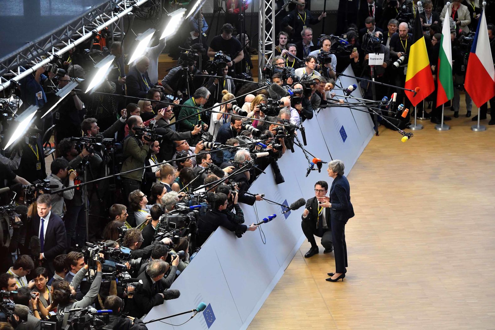 May speaks to the press in March 2019 as she arrives in Brussels, Belgium, for the first day of an EU summit focused on Brexit.