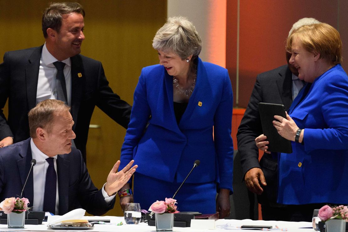 Theresa May with European leaders in Brussels. They came to disrust anything she said.