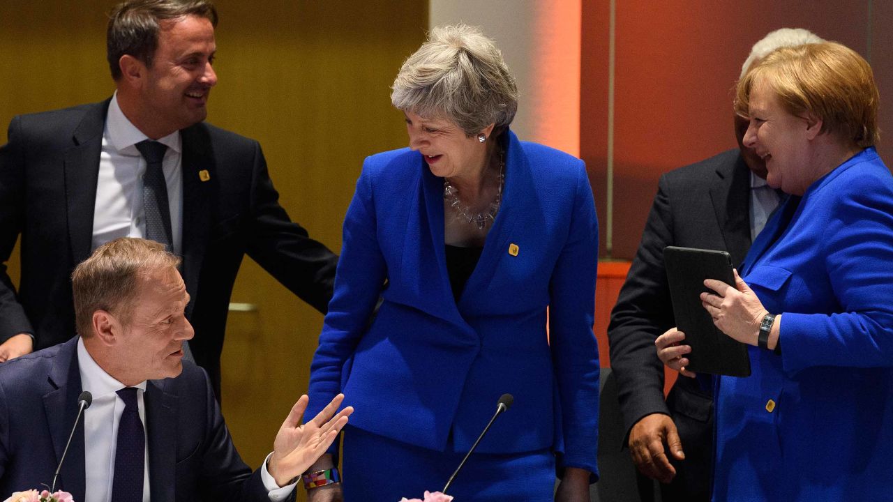 Theresa May with European leaders in Brussels. They came to disrust anything she said.