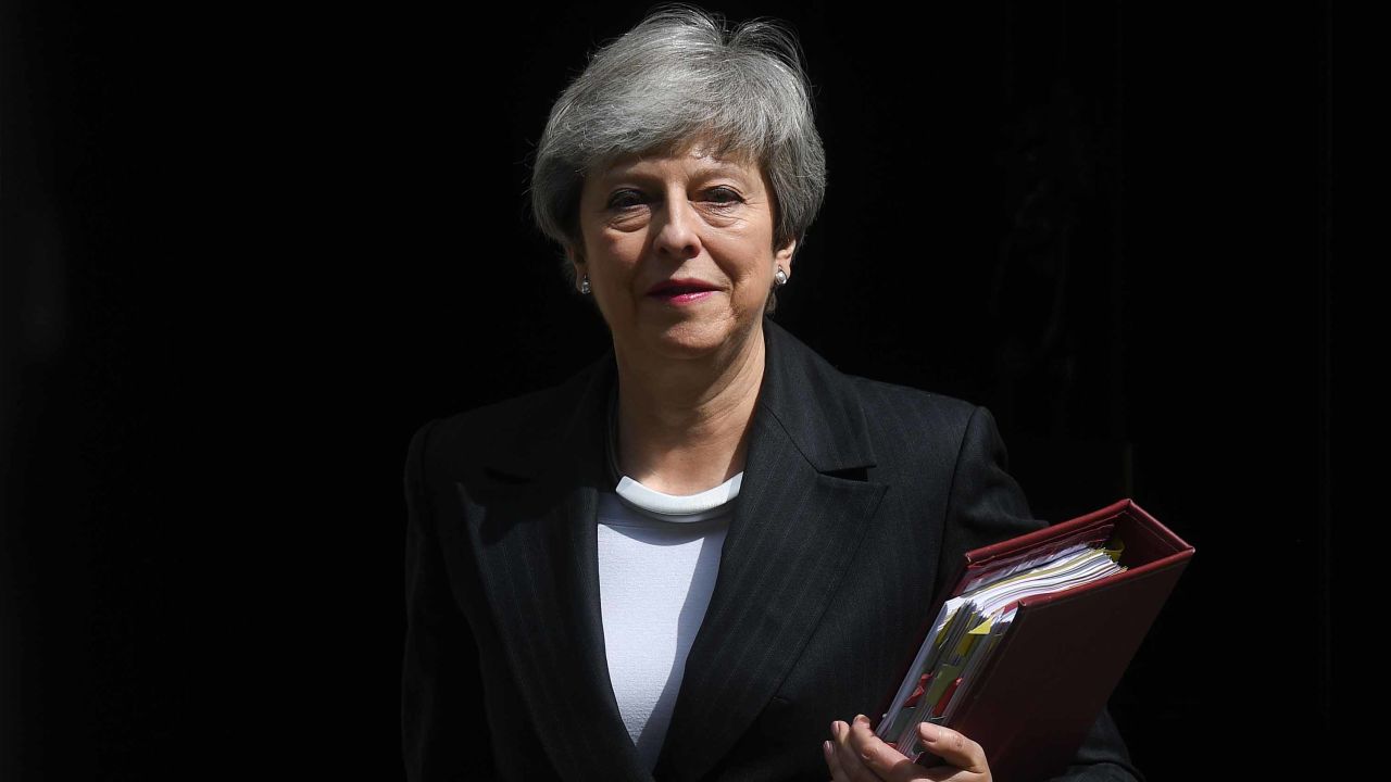 Britain's Prime Minister Theresa May leaves 10 Downing Street in London on May 22, 2019, ahead of the weekly Prime Minister's Questions (PMQs) question and answer session in the House of Commons. - British Prime Minister Theresa May's final bid to salvage her EU divorce deal appeared doomed on Wednesday as pro-Brexit Conservatives and opposition MPs rejected her attempts at a compromise to end months of deadlock. (Photo by Daniel LEAL-OLIVAS / AFP)        (Photo credit should read DANIEL LEAL-OLIVAS/AFP/Getty Images)