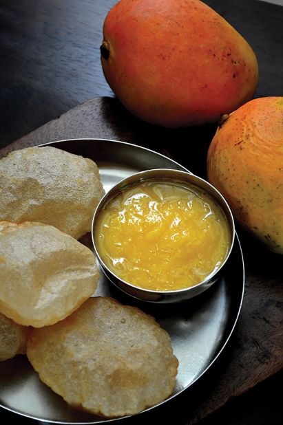 <strong>Aamras puri: </strong>Plain, pureed mango pulp is the star of the dish (in Hindi, "aam" translates to mango, and "ras" to juice). 