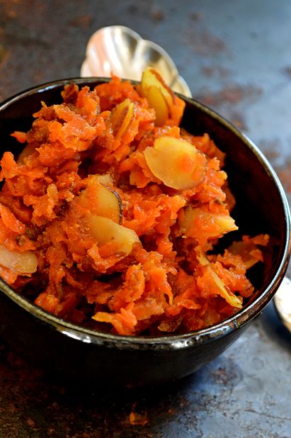 <strong>Gajar halwa: </strong>This shredded carrot dish is often served heaped in a bowl, with the vivid carrots topped with bright green pistachios or delicately slivered almonds.