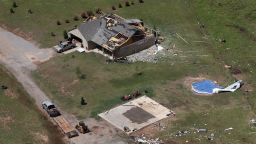 A house damaged in a tornado Monday, May 20, 2019, in Mangum, Okla., is pictured from the air Tuesday, May 21. A strong band of storms has spawned more than 30 tornadoes across the central U.S., damaging homes in Oklahoma, demolishing a rack track grandstand in Missouri and drenching waterlogged states with more water and more flooding. (AP Photo/Sue Ogrocki)