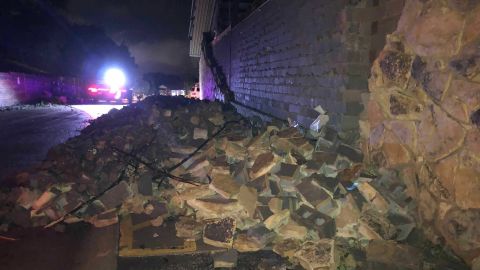 The storm leaves a wall  collapsed Thursday morning in Missouri's capital.