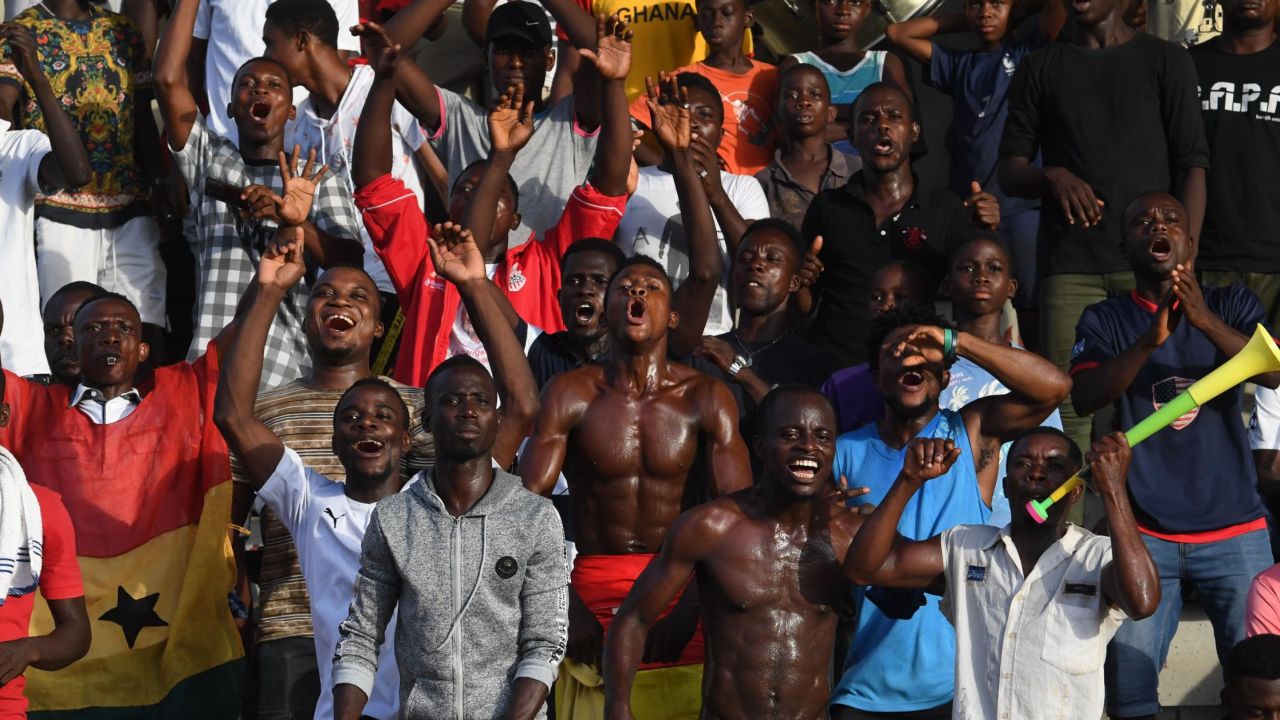 Supporters cheer during the WAFU semi-final between Ghana and Nigeria.