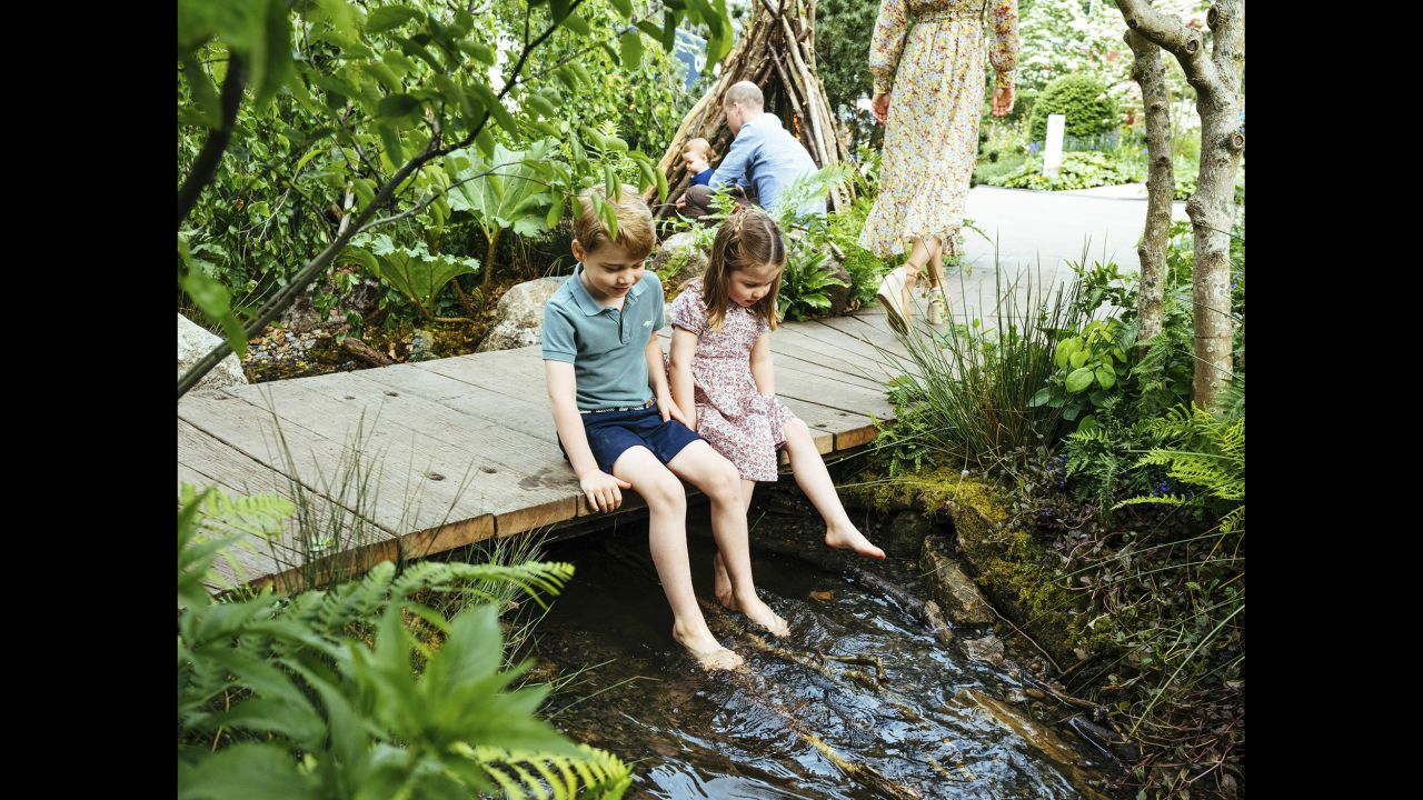 Britain's Prince George and his sister, Princess Charlotte, sit together in a garden ahead of the Chelsea Flower Show in London. It was <a href="https://www.cnn.com/2019/05/19/uk/kensington-palace-royal-family-photos-trnd/index.html" target="_blank">one of several family photos</a> released by Kensington Palace on Sunday, May 19.