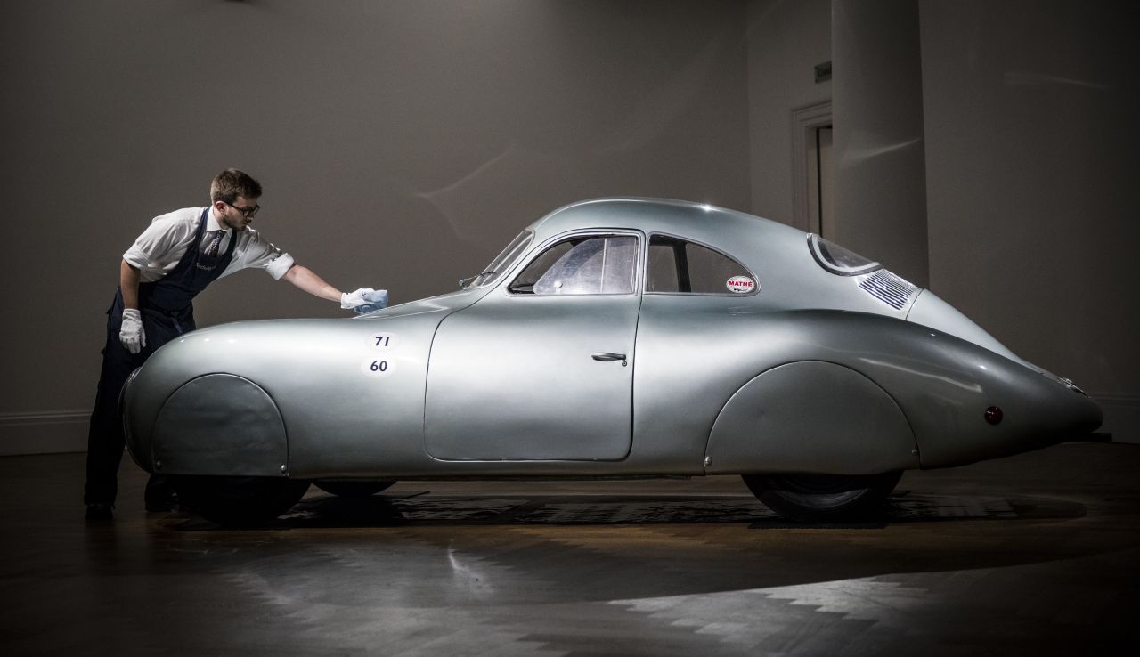 This Porsche Type 64, the great-grandfather of the iconic Porsche 911, is displayed at the Sotheby's auction house in London on Tuesday, May 21. As the earliest Porsche sports car, and with a direct lineage to today's 911s, <a href="https://www.cnn.com/2019/05/23/success/sothebys-first-porsche-auction/index.html" target="_blank">it could be worth $20 million to $25 million,</a> according to experts at Hagerty, a company that insures collectible cars. That would make it the most valuable Porsche ever sold. It will be put up for auction in mid-August.