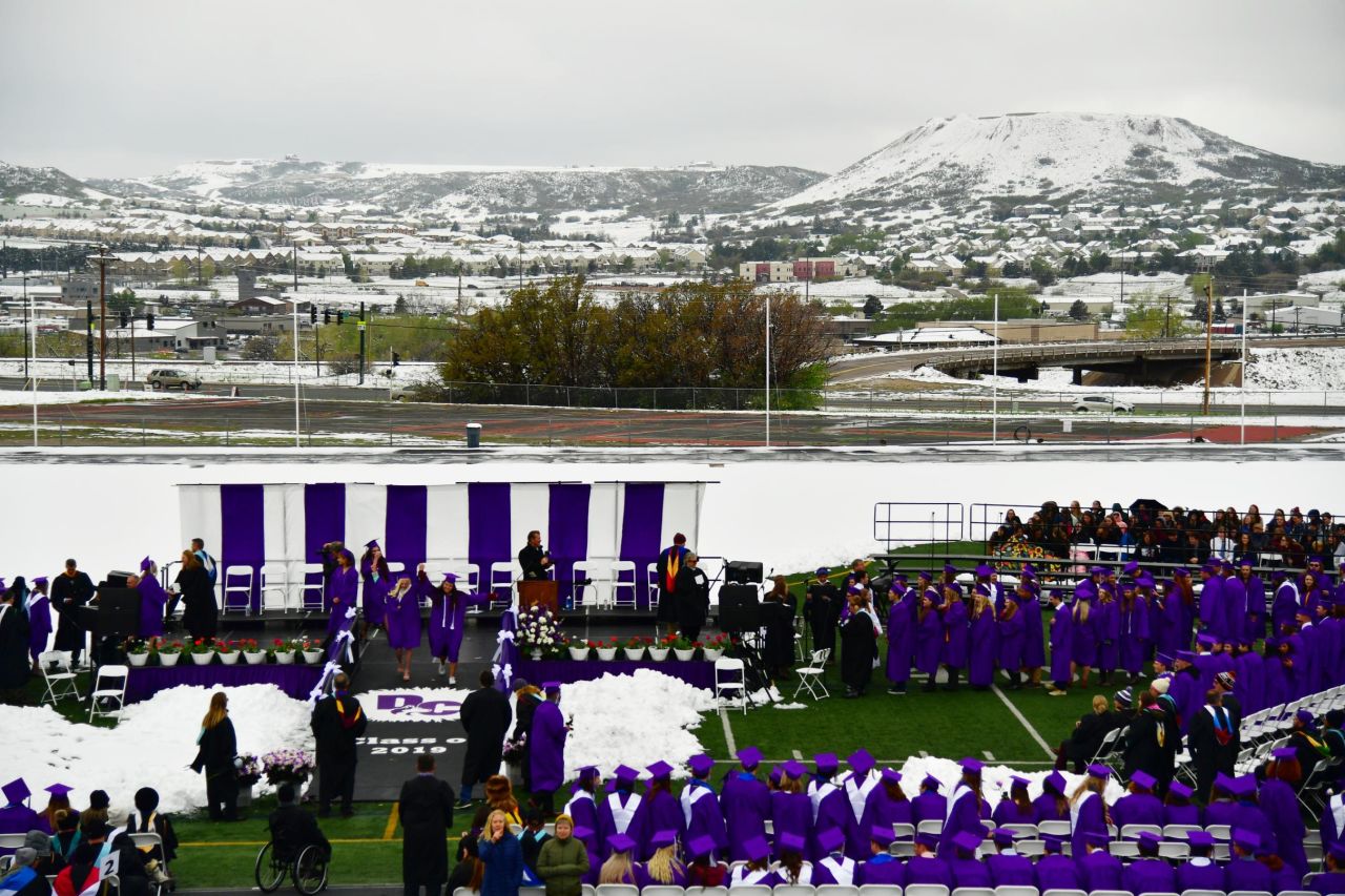 Students in Castle Rock, Colorado, just outside of Denver, attend graduation ceremonies at Douglas County High School on Tuesday, May 21. <a href="https://www.cnn.com/2019/05/21/us/colorado-snow-summer-weather-trnd/index.html" target="_blank">A record-breaking spring storm</a> dumped several inches of snow just days before school let out for summer break.