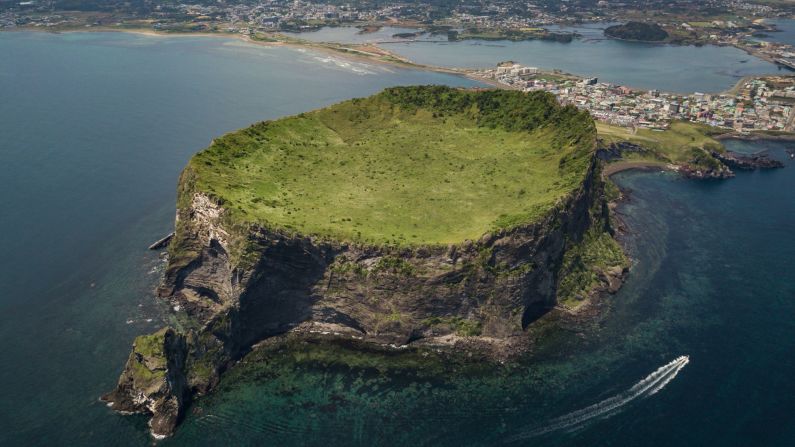 <strong>Jeju Island, South Korea:</strong> Seongsan Ichulbong, or Sunrise Peak, is a 182-meter high volcanic rock formation, some 5,000 years old. <br />