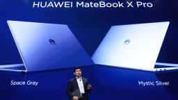 Richard Yu, head of Huawei's consumer business group, presents the MateBook X Pro laptop computer during a launch event. 