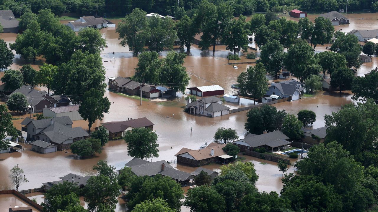 Floodwaters from the Arkansas River inundate homes Thursday in Sand Springs, Oklahoma. 