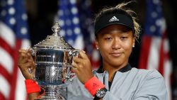 NEW YORK, NY - SEPTEMBER 08:  Naomi Osaka of Japan poses with the championship trophy after winning the Women's Singles finals match against Serena Williams of the United States on Day Thirteen of the 2018 US Open at the USTA Billie Jean King National Tennis Center on September 8, 2018 in the Flushing neighborhood of the Queens borough of New York City.  (Photo by Julian Finney/Getty Images)