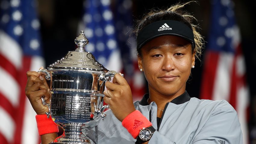 NEW YORK, NY - SEPTEMBER 08:  Naomi Osaka of Japan poses with the championship trophy after winning the Women's Singles finals match against Serena Williams of the United States on Day Thirteen of the 2018 US Open at the USTA Billie Jean King National Tennis Center on September 8, 2018 in the Flushing neighborhood of the Queens borough of New York City.  (Photo by Julian Finney/Getty Images)