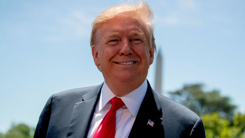 President Donald Trump smiles while speaking to members of the media on the South Lawn of the White House in Washington, Friday, May 24, 2019, before boarding Marine One for a short trip to Andrews Air Force Base, Md, and then on to Tokyo. (AP/Andrew Harnik)