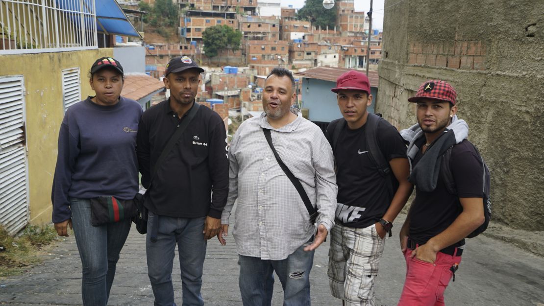 Colectivo leader Naudy Mendez stands at the center with four of his lieutenants in the Antímano neighborhood of Caracas. 