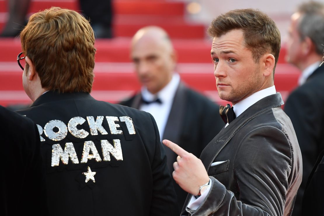 Elton John and British actor Taron Egerton, who plays the singer in "Rocketman," appear on the red carpet for the film's hot-ticket premiere May 16.