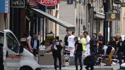French police search for evidences in front the 'Brioche doree' after a suspected package bomb blast along a pedestrian street in the heart of Lyon, southeast France on May 24, 2019. - Several people were wounded by a suspected package bomb blast on a pedestrian street in the heart of Lyon in southeastern France, the local prosecutors' office said. The area where the explosion occurred, on the narrow strip of land between the Saone and Rhone rivers in the historic city centre, has been evacuated, according to AFP journalists at the scene. (Photo by PHILIPPE DESMAZES / AFP)        (Photo credit should read PHILIPPE DESMAZES/AFP/Getty Images)