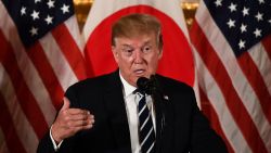 US President Donald Trump speaks during a meeting with business leaders in Tokyo on May 25, 2019. - US President Donald Trump arrived in Japan on May 25 for a four-day trip likely to be dominated by warm words and friendly images, but relatively light on substantive progress over trade. (Photo by Brendan SMIALOWSKI / AFP)        (Photo credit should read BRENDAN SMIALOWSKI/AFP/Getty Images)
