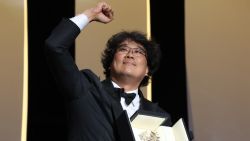 South Korean director Bong Joon-Ho celebrates on stage with his trophy after he was awarded with the Palme d'Or for the film "Parasite (Gisaengchung)" on May 25, 2019 during the closing ceremony of the 72nd edition of the Cannes Film Festival in Cannes, southern France. (Photo by Valery HACHE / AFP)        (Photo credit should read VALERY HACHE/AFP/Getty Images)